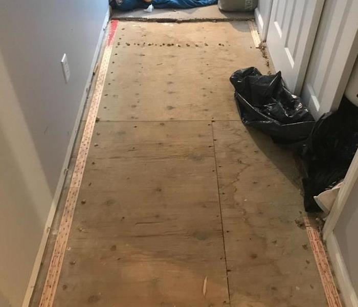 hallway with carpet removed