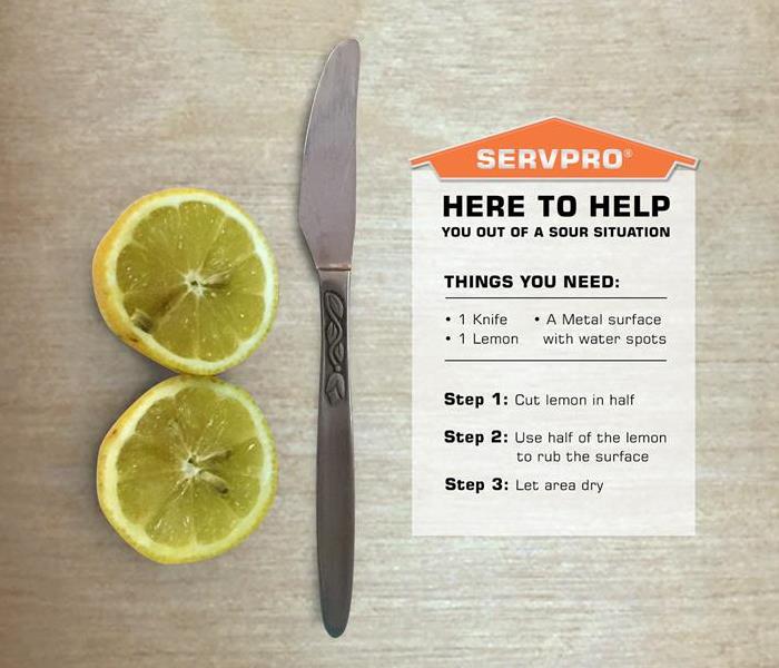 Lemon and a knife to remove water spots on metal surfaces