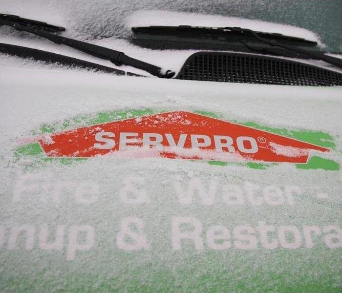 servpro green vehicle with snow